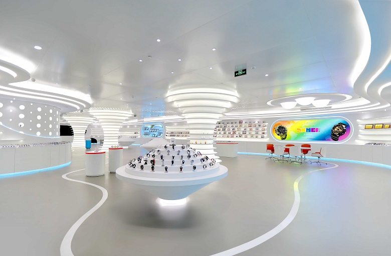 The brand showroom, watches on lit plinths under a curved ceiling. SKMEI calls this an industry leading high-tech brand showroom.